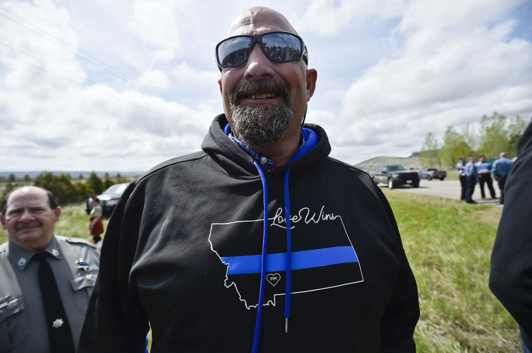 Pastor Curtis Crow wears a sweatshirt
